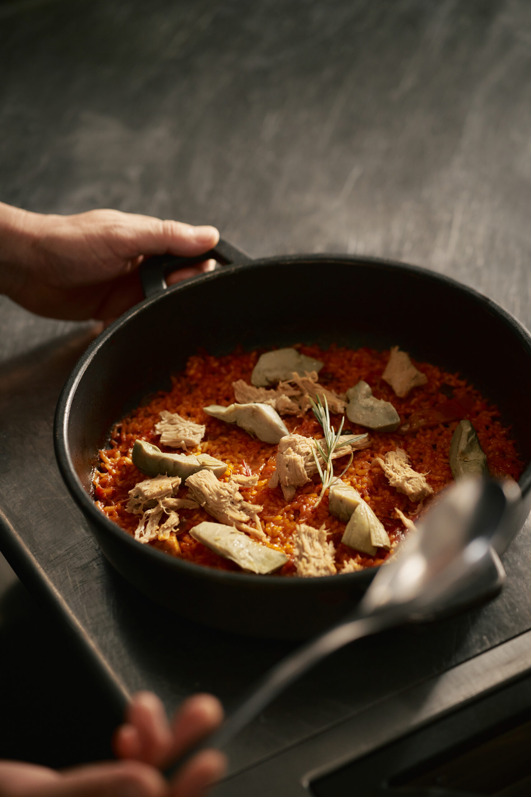 Rice with Pulled Chicken Style, confit artichokes and black garlic aioli